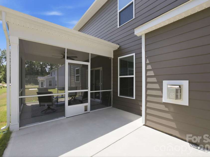 311 Coronado Avenue, Matthews, NC 28104.  MLS# CAR4400272, YatesRealty ID 40201. Concrete rear patio for grilling or entertaining