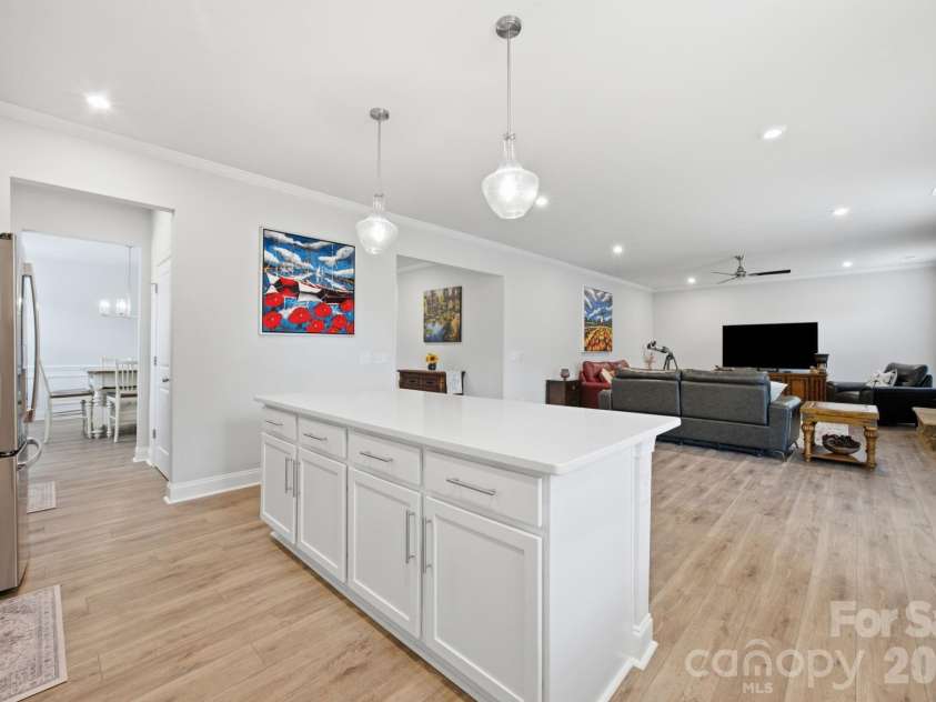 311 Coronado Avenue, Matthews, NC 28104.  MLS# CAR4400272, YatesRealty ID 40201. Kitchen opens into the main living area