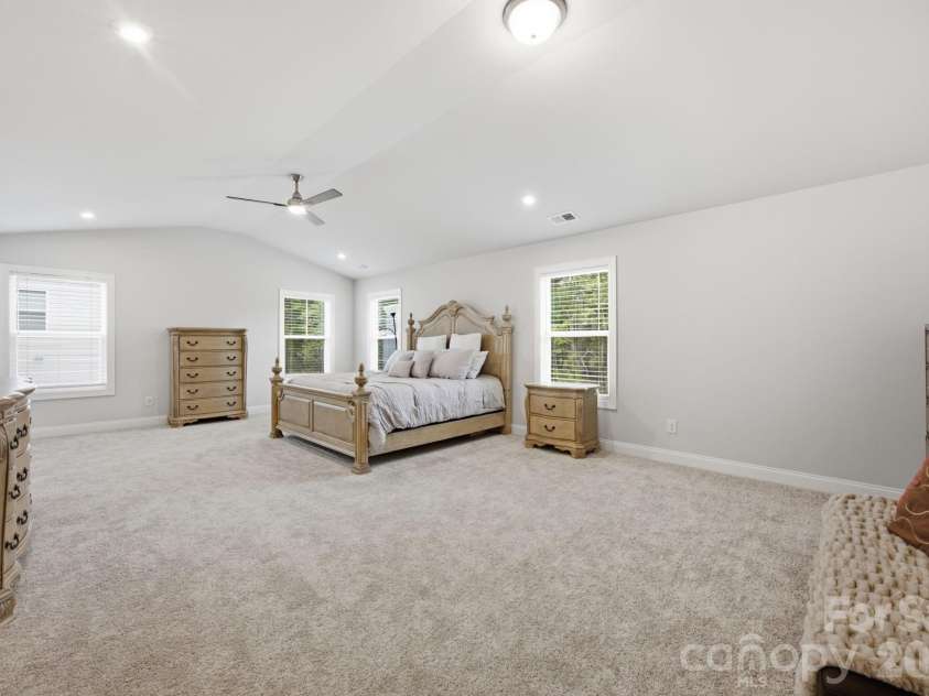 311 Coronado Avenue, Matthews, NC 28104.  MLS# CAR4400272, YatesRealty ID 40201. Large primary bedroom