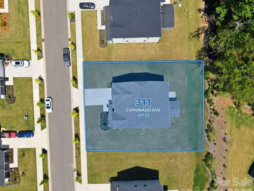 311 Coronado Avenue, Matthews, NC 28104.  MLS# CAR4400272, YatesRealty ID 40201. Lot lines are approximate