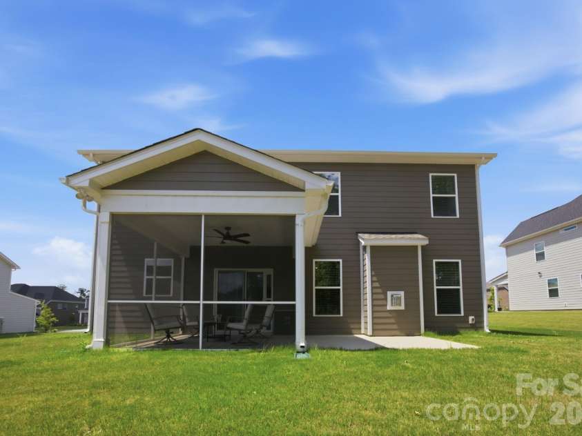 311 Coronado Avenue, Matthews, NC 28104.  MLS# CAR4400272, YatesRealty ID 40201. Screened in porch, concrete patio