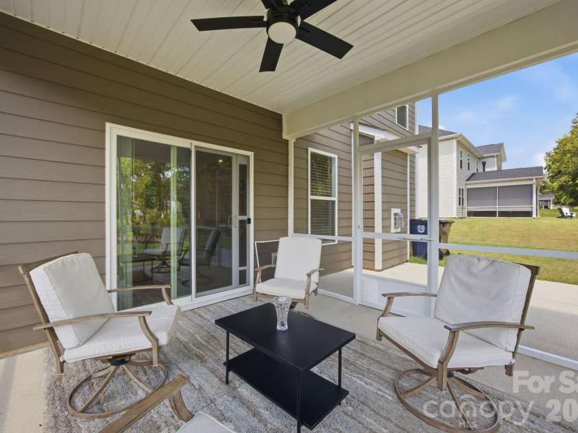 311 Coronado Avenue, Matthews, NC 28104.  MLS# CAR4400272, YatesRealty ID 40201. Screened in porch with ceiling fan