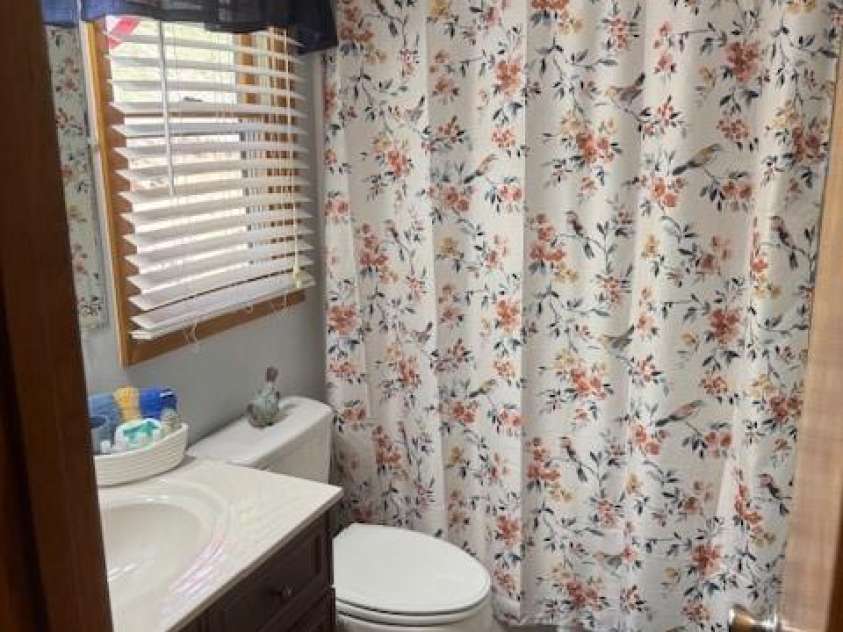 918 Plott Balsam Road, Maggie Valley, NC 28751.  MLS# CAR4383857, YatesRealty ID 40202. Lower Level Full Bathroom