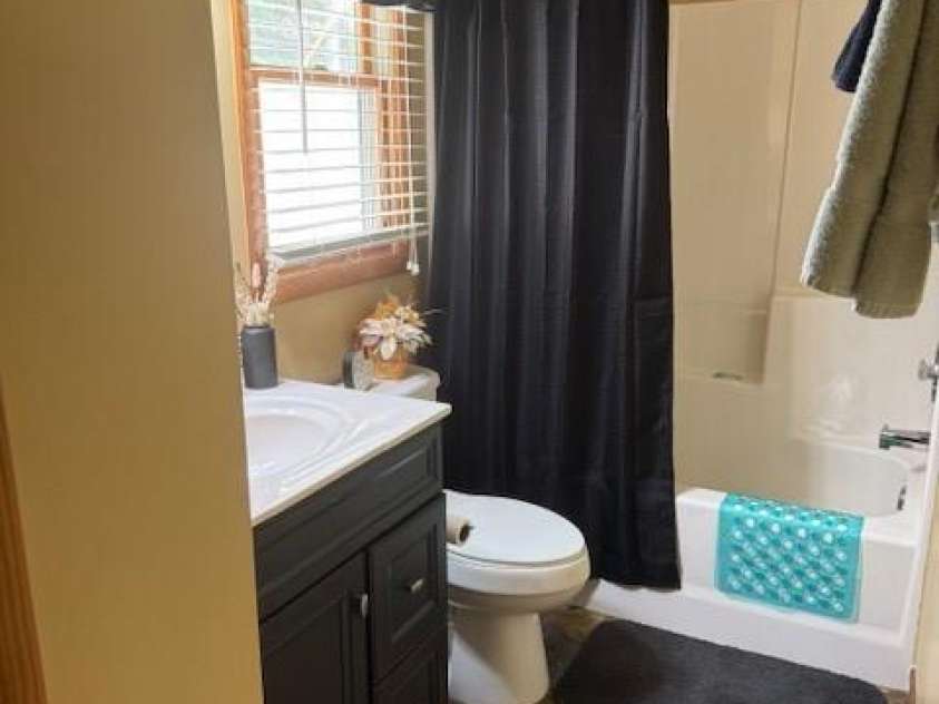 918 Plott Balsam Road, Maggie Valley, NC 28751.  MLS# CAR4383857, YatesRealty ID 40202. Upstairs Bathoom