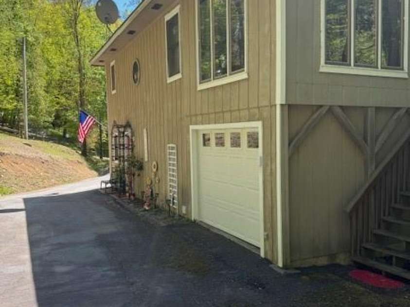 918 Plott Balsam Road, Maggie Valley, NC 28751.  MLS# CAR4383857, YatesRealty ID 40202. View looking at Front Elevation of Cabin