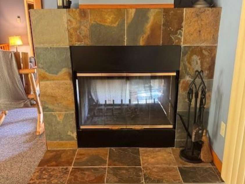 918 Plott Balsam Road, Maggie Valley, NC 28751.  MLS# CAR4383857, YatesRealty ID 40202. View of Double Sided Fireplace