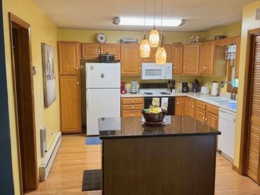 918 Plott Balsam Road, Maggie Valley, NC 28751.  MLS# CAR4383857, YatesRealty ID 40202. View of Kitchen