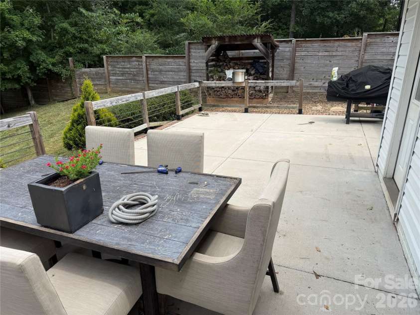 1945 Old Farm Road, Concord, NC 28025.  MLS# CAR4407239, YatesRealty ID 40208. Back Patio