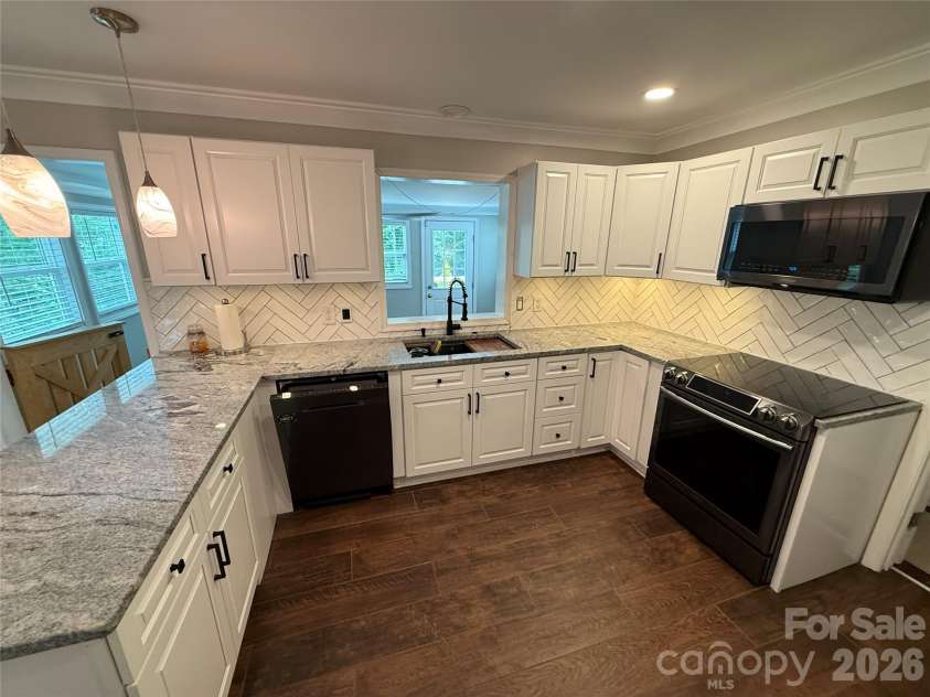 1945 Old Farm Road, Concord, NC 28025.  MLS# CAR4407239, YatesRealty ID 40208. Kitchen