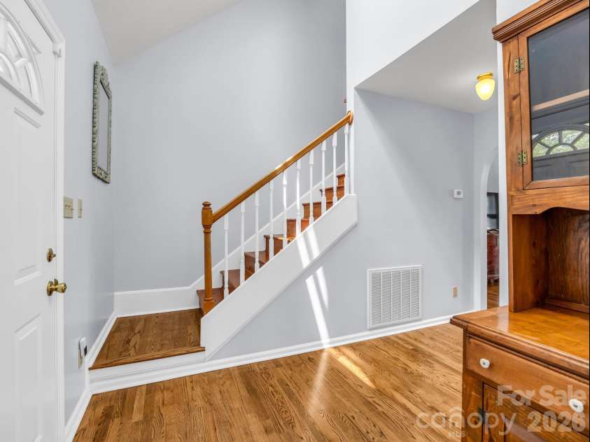 2778 Moose Gantt Trail, Crouse, NC 28033.  MLS# CAR4407300, YatesRealty ID 40211. Front entry area and stairs to upper floor