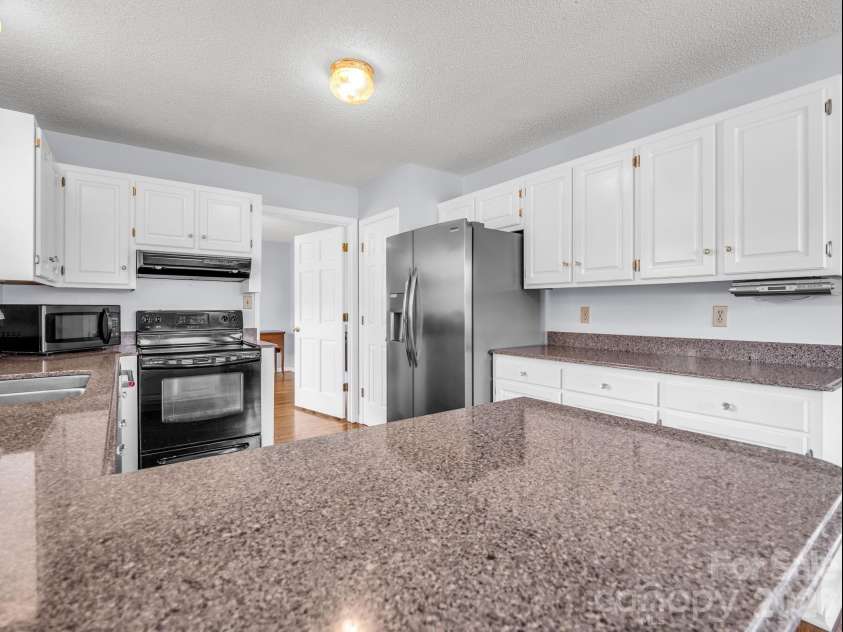 2778 Moose Gantt Trail, Crouse, NC 28033.  MLS# CAR4407300, YatesRealty ID 40211. Kitchen with pantry