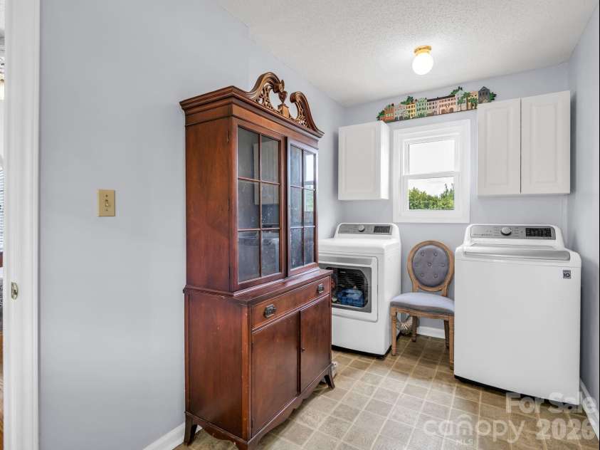 2778 Moose Gantt Trail, Crouse, NC 28033.  MLS# CAR4407300, YatesRealty ID 40211. Laundry/mudroom just inside carport door for organizing