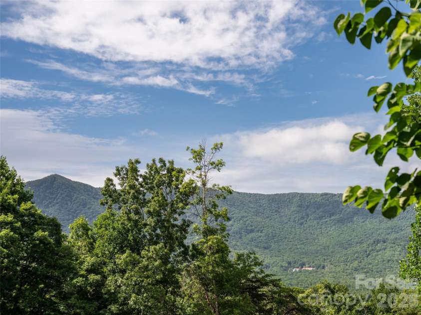 125 Craggy Street, Black Mountain, NC 28711.  MLS# CAR4407539, YatesRealty ID 40218. Surrounding mountains -- views from front