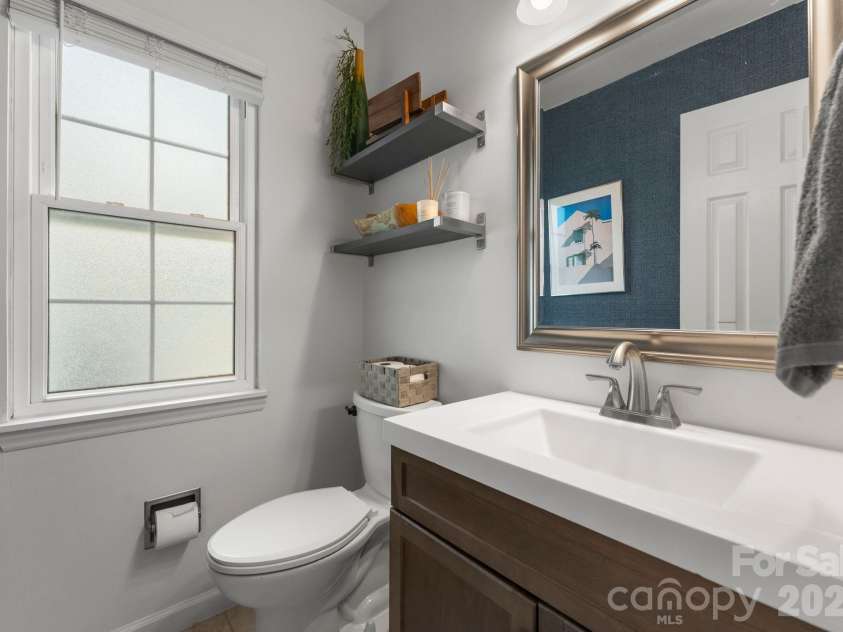 153 Ashford Hollow Lane, Mooresville, NC 28117.  MLS# CAR4384796, YatesRealty ID 4022. Half Bathroom