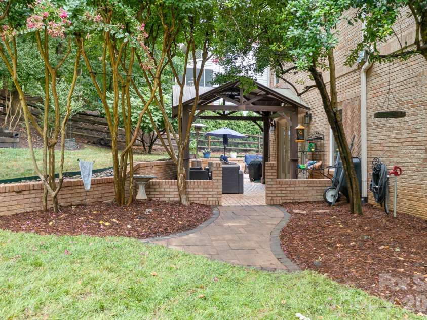 7048 Mariners Court, Tega Cay, SC 29708.  MLS# CAR4408357, YatesRealty ID 40235. Beautifully landscaped backyard