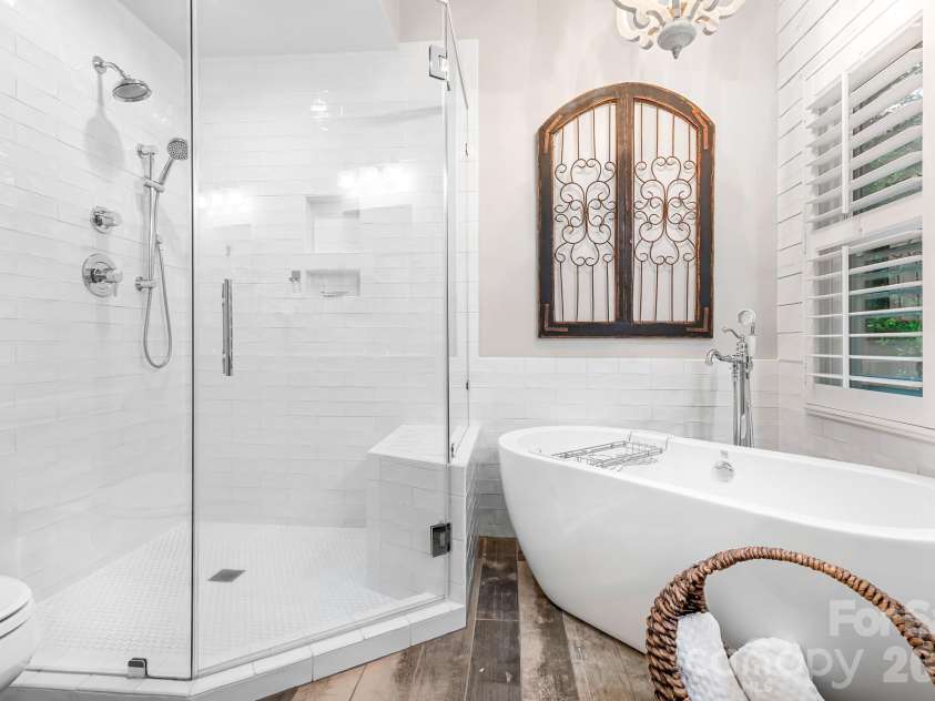 7048 Mariners Court, Tega Cay, SC 29708.  MLS# CAR4408357, YatesRealty ID 40235. Fully Remodeled Primary Bathroom