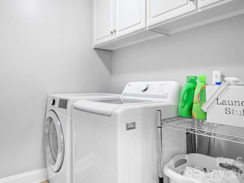 7048 Mariners Court, Tega Cay, SC 29708.  MLS# CAR4408357, YatesRealty ID 40235. Laundry Room