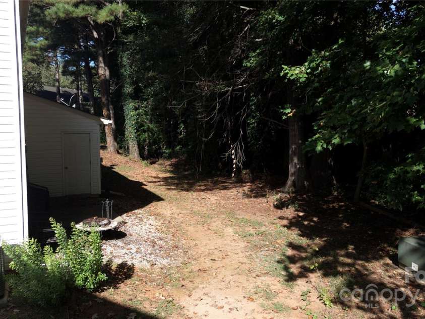 5375 Kimmerly Woods Drive, Charlotte, NC 28215.  MLS# CAR4305841, YatesRealty ID 40241. Home Backyard
