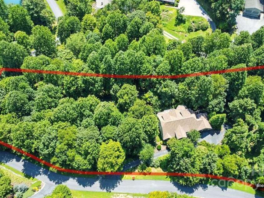 301 Gateway Drive, Hendersonville, NC 28739.  MLS# CAR4294263, YatesRealty ID 40247. Enjoy spacious privacy on the 1.4 acre property at 301 Gateway Drive in the sought-after Pathways of Solomon Jones.