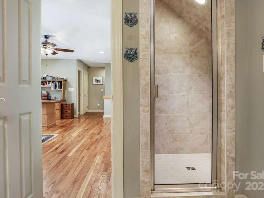301 Gateway Drive, Hendersonville, NC 28739.  MLS# CAR4294263, YatesRealty ID 40247. Here is the custom tiled shower.