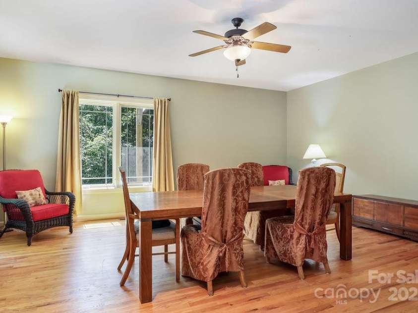 301 Gateway Drive, Hendersonville, NC 28739.  MLS# CAR4294263, YatesRealty ID 40247. Let's go downstairs to see more fun rooms.This is the media/entertainment room that opens out to a deck. 