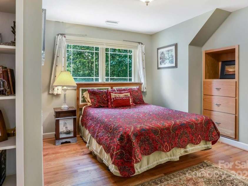 301 Gateway Drive, Hendersonville, NC 28739.  MLS# CAR4294263, YatesRealty ID 40247. Let's go to the other side of the loft to see the second ensuite guest bedroom.