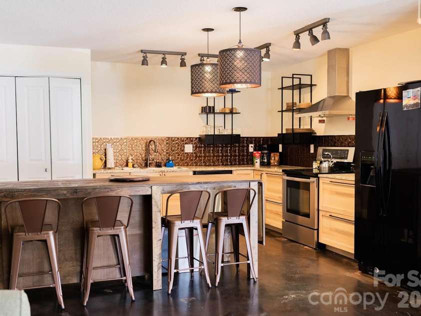 309 London Road, Asheville, NC 28803.  MLS# CAR4353923, YatesRealty ID 4025. Lower apartment kitchen
