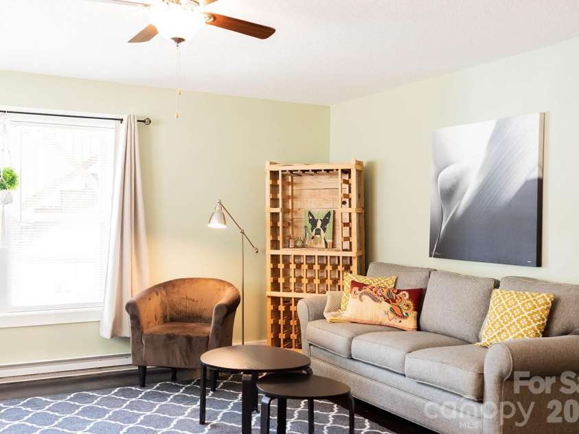 309 London Road, Asheville, NC 28803.  MLS# CAR4353923, YatesRealty ID 4025. Lower living area