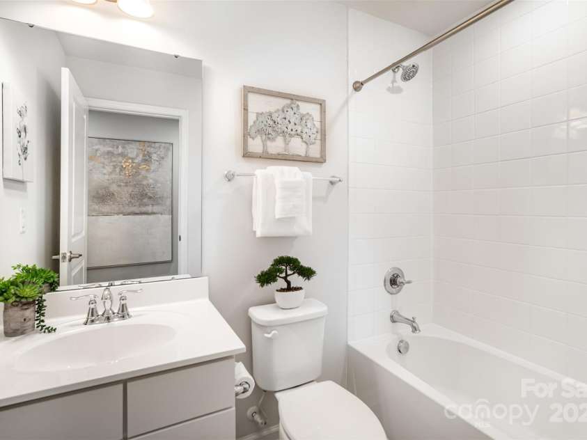 407 Park Meadows Drive, Matthews, NC 28104.  MLS# CAR4287821, YatesRealty ID 40250. The hall bathroom for the secondary bedrooms is as well maintained as the rest of the home!