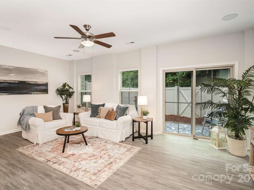 407 Park Meadows Drive, Matthews, NC 28104.  MLS# CAR4287821, YatesRealty ID 40250. The sliding door offers easy access to the private rear patio.