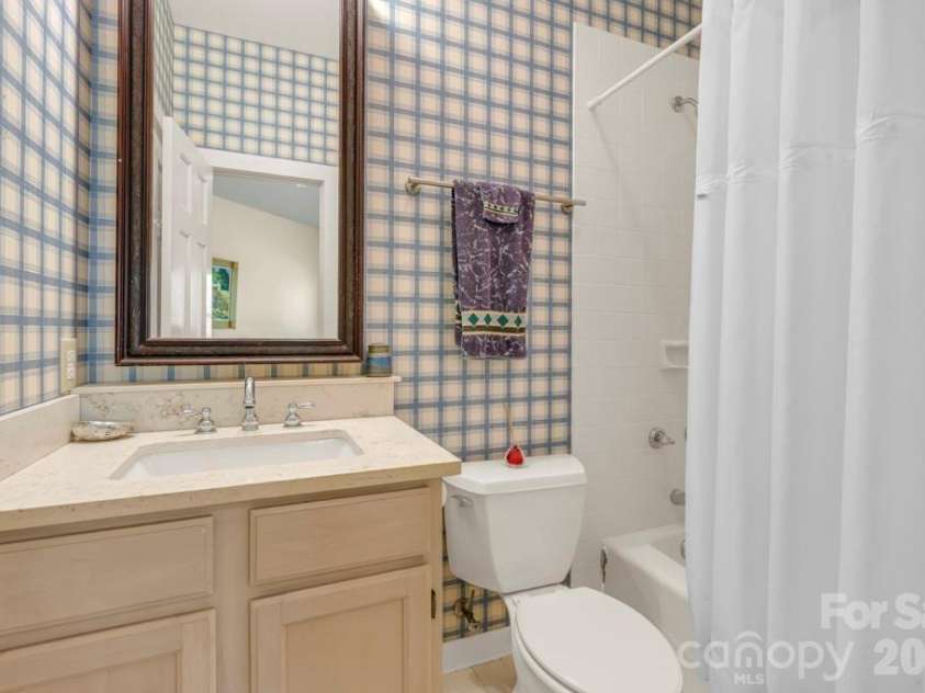 1590 Shulls Mill Road, Boone, NC 28607.  MLS# CAR4389715, YatesRealty ID 40251. Lower-level bedroom suite bath