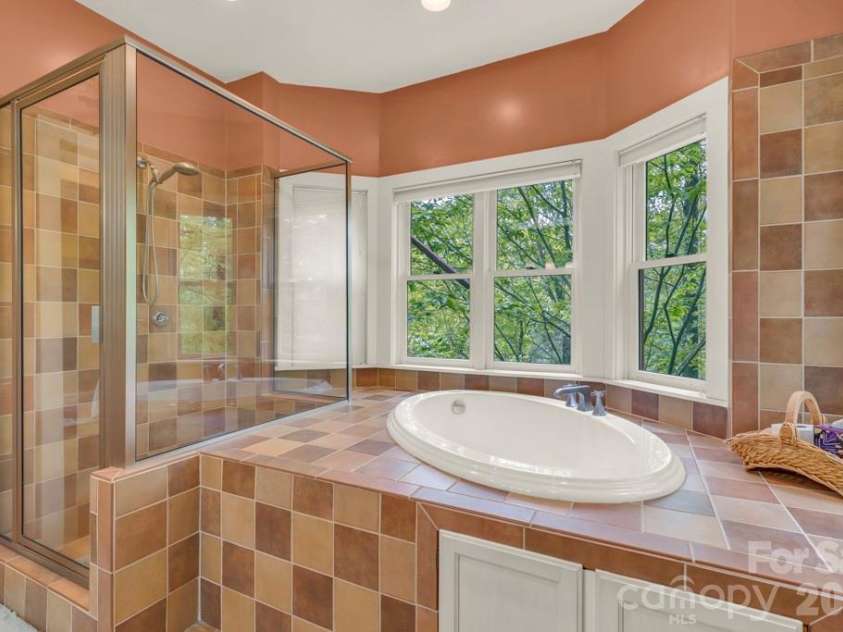 1590 Shulls Mill Road, Boone, NC 28607.  MLS# CAR4389715, YatesRealty ID 40251. Lower-level studio bedroom suite bath