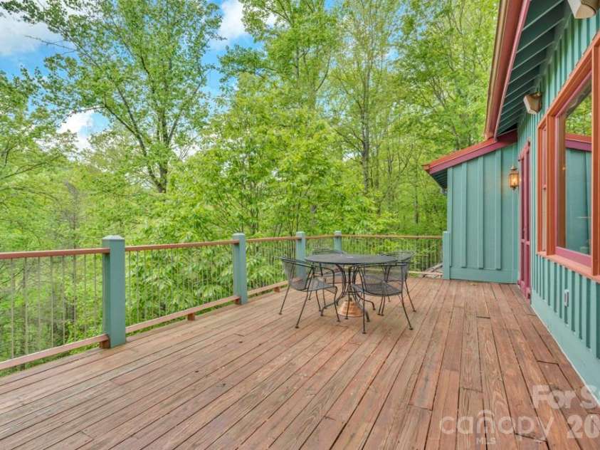 1590 Shulls Mill Road, Boone, NC 28607.  MLS# CAR4389715, YatesRealty ID 40251. Main-level wrap-around deck