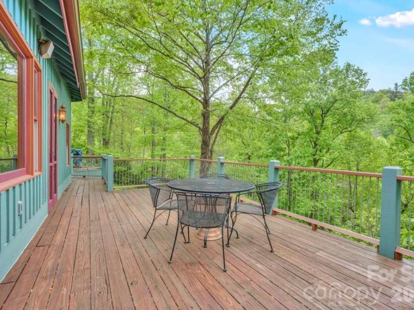 1590 Shulls Mill Road, Boone, NC 28607.  MLS# CAR4389715, YatesRealty ID 40251. Main-level wrap-around deck