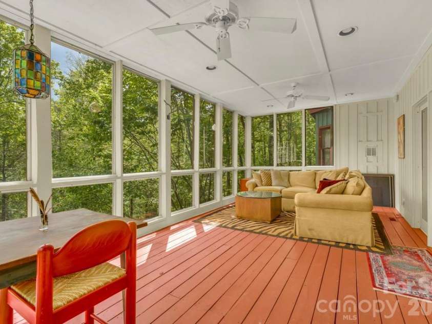 1590 Shulls Mill Road, Boone, NC 28607.  MLS# CAR4389715, YatesRealty ID 40251. Sunroom off lower level suite