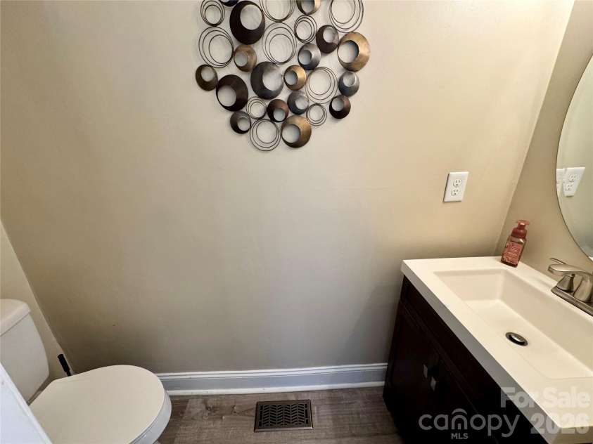 205 Tournament Drive, Concord, NC 28025.  MLS# CAR4407976, YatesRealty ID 40257. Half bath on the main level