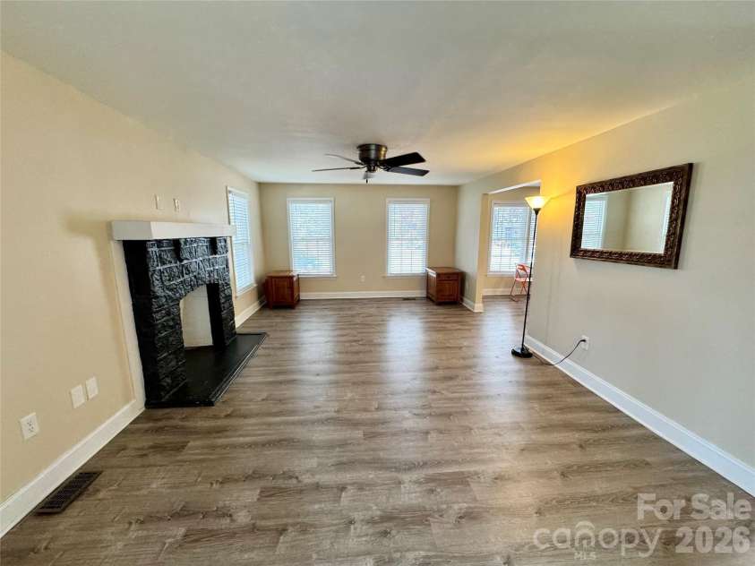 205 Tournament Drive, Concord, NC 28025.  MLS# CAR4407976, YatesRealty ID 40257. Living room
