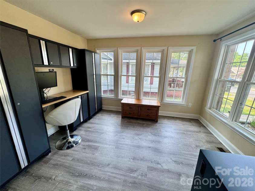 205 Tournament Drive, Concord, NC 28025.  MLS# CAR4407976, YatesRealty ID 40257. Sunroom makes a great home office!
