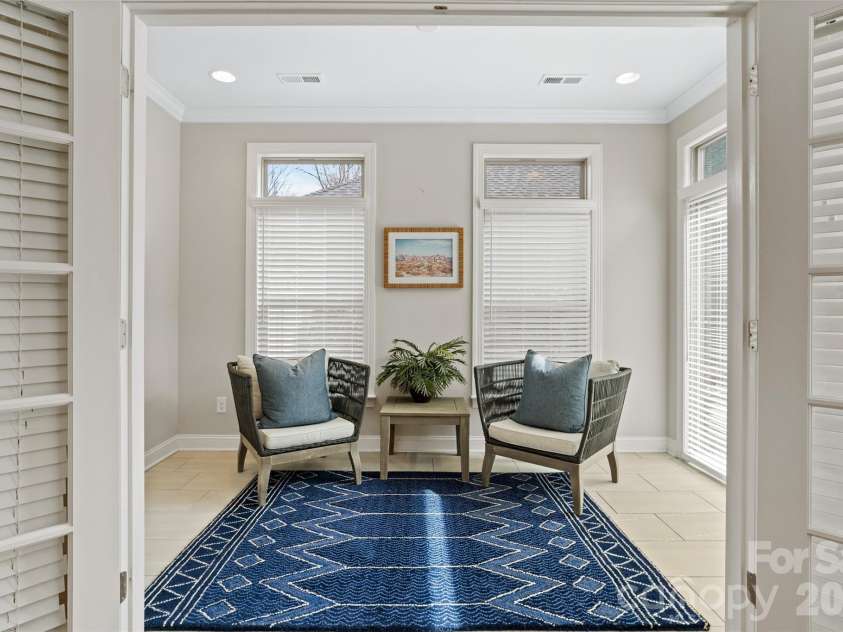 2106 Epworth Court, Waxhaw, NC 28173.  MLS# CAR4356029, YatesRealty ID 4026. Extended sunroom off of primary bedroom suite, overlooking back garden/patio
