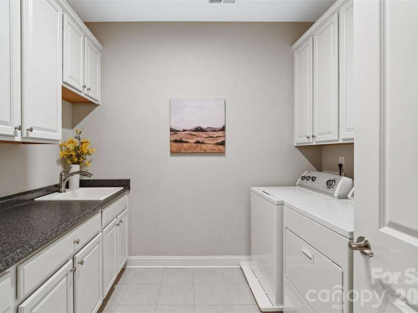 2106 Epworth Court, Waxhaw, NC 28173.  MLS# CAR4356029, YatesRealty ID 4026. Generously sized laundry room w/ utility sink