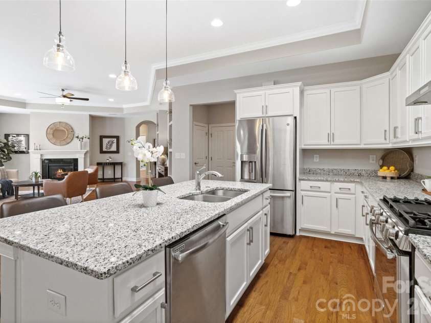2106 Epworth Court, Waxhaw, NC 28173.  MLS# CAR4356029, YatesRealty ID 4026. Kitchen with island and SS appliances