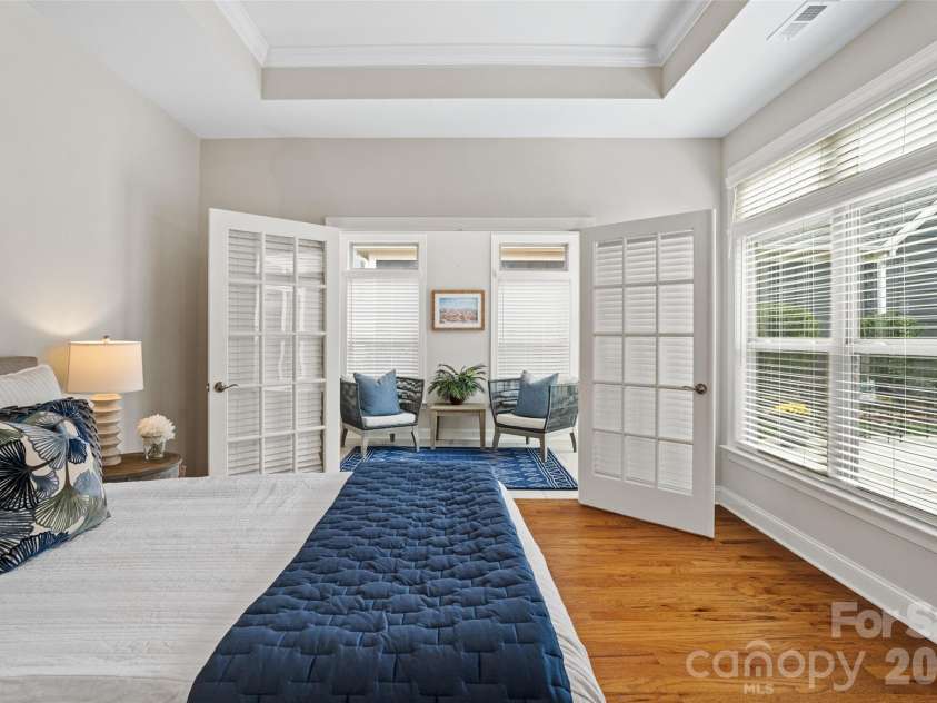 2106 Epworth Court, Waxhaw, NC 28173.  MLS# CAR4356029, YatesRealty ID 4026. Primary bedroom suite with extended sunroom and french doors