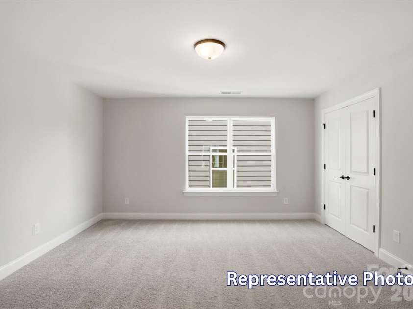 128 Swing Way, Troutman, NC 28166.  MLS# CAR4391618, YatesRealty ID 40277. Bedroom 2
