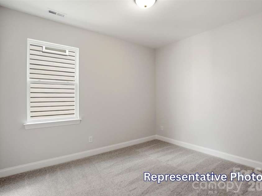 128 Swing Way, Troutman, NC 28166.  MLS# CAR4391618, YatesRealty ID 40277. Bedroom 3