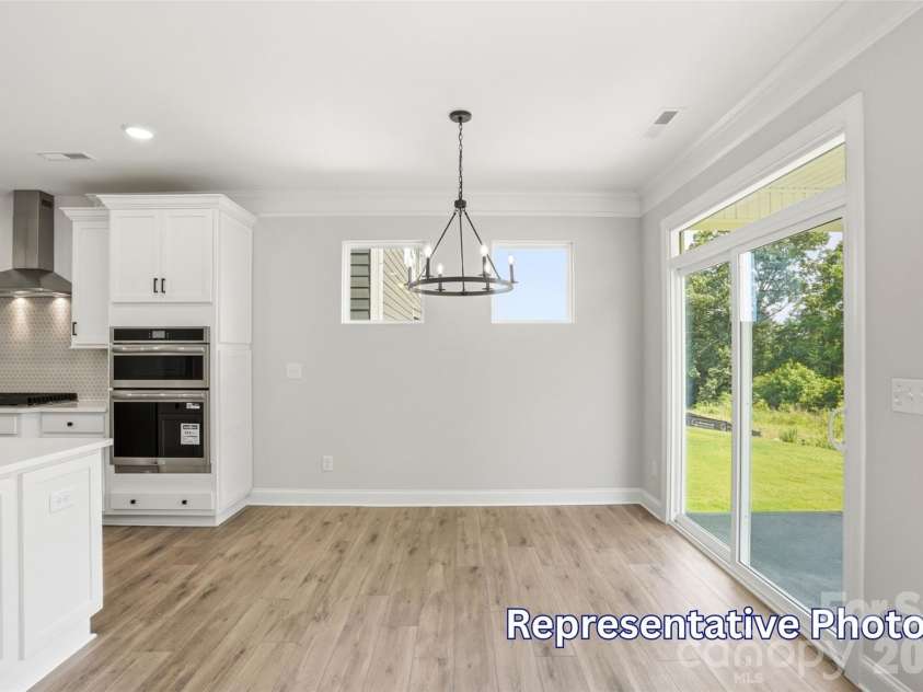 128 Swing Way, Troutman, NC 28166.  MLS# CAR4391618, YatesRealty ID 40277. Breakfast Area