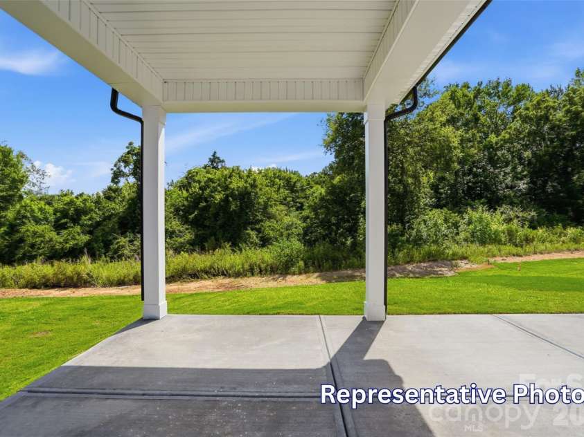 128 Swing Way, Troutman, NC 28166.  MLS# CAR4391618, YatesRealty ID 40277. Covered porch