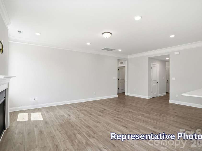 128 Swing Way, Troutman, NC 28166.  MLS# CAR4391618, YatesRealty ID 40277. Family Room