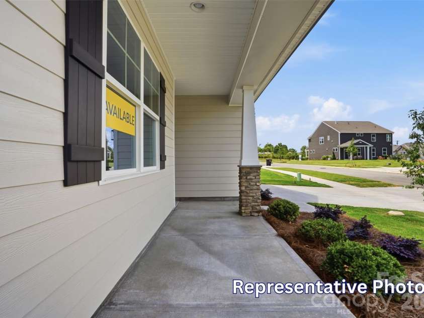 128 Swing Way, Troutman, NC 28166.  MLS# CAR4391618, YatesRealty ID 40277. Front porch