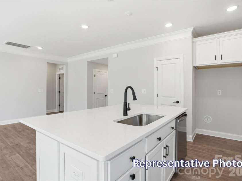 128 Swing Way, Troutman, NC 28166.  MLS# CAR4391618, YatesRealty ID 40277. Kitchen