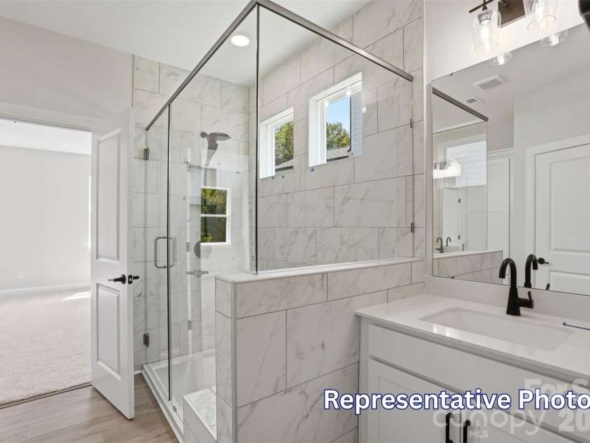 128 Swing Way, Troutman, NC 28166.  MLS# CAR4391618, YatesRealty ID 40277. Primary Bathroom